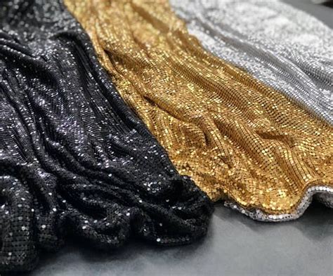 flimsy metal with coloured fabric over it|metallic fabric designs.